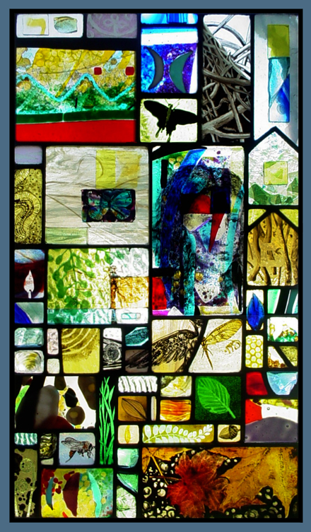 a stained glass window which explores the inner dimensions by joining a psychedelic arrangement of color and naturalforms with a subdued or pensive mood