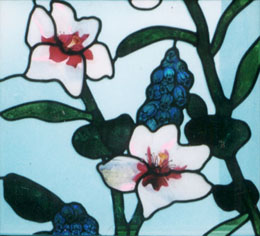 stained glass detail with rose of Sharon and hyacinth from larger church window 